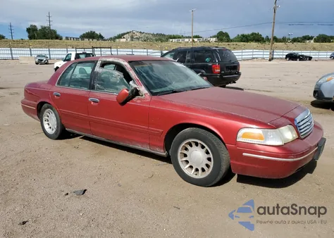 2000 Ford Crown Victoria Lx z USA, uszkodzony, nr VIN 2FAFP74W4YX100974